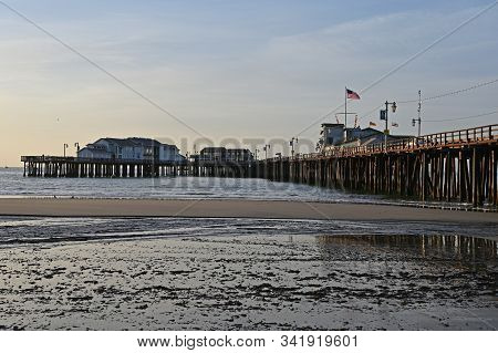 Santa Barbara, California - May 18, 2019: Stearns Wharf At Sunrise Under Colorful High Altitude Clou
