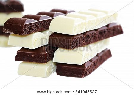 Chocolate Is White And Black. Porous Chocolate. Dessert. Cocoa.