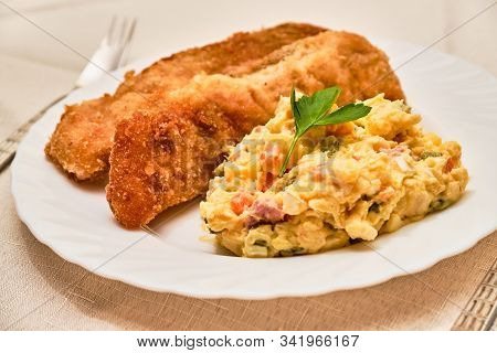 Tasty Homemade Fried Carp Fish With Potato Salad - Kapr A Bramborovy Salat - On White Plate On Cloth