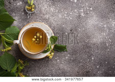 Healthy Hot Linden Tea In Cup On Grey Background