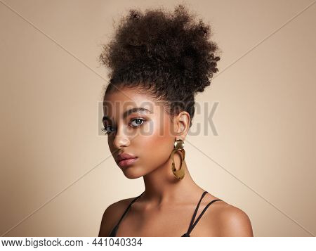 Beauty Portrait Of African American Girl With Afro Hair. Beautiful Black Woman. Cosmetics, Makeup An
