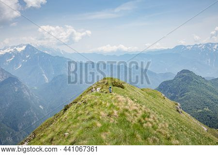 Young Child Boy Hiker Conquer The Peaks Of Amazing Mountain Trail Monte Montusel In Friuli-venezia G