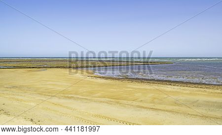 Landscape Of Beautiful Sandy Great Beach In Chipiona Town, Cadiz, Andalusia, Spain
