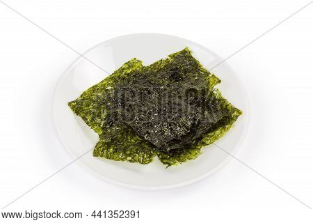 Thin Dried Sheets Of Nori Seaweed Snack On A White Dish On A White Background