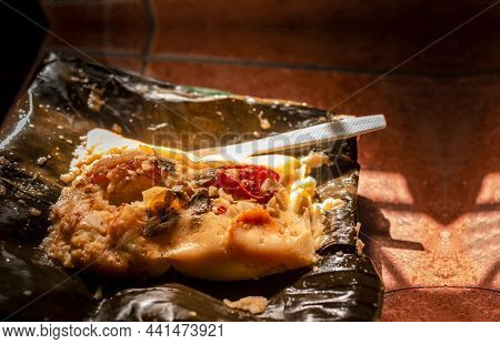 Nacatamal Served In Banana Leaf, Close Up Of Nicaraguan Nacatamal, Typical Nicaraguan Food El Nacata
