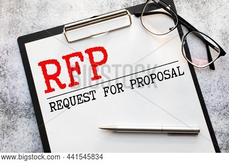 Rfp- Request For Proposal Written In Notebook.