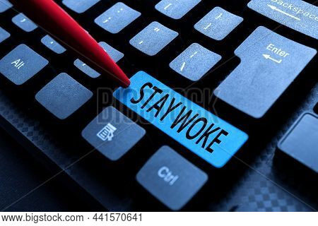 Hand Writing Sign Stay Woke. Word For Being Aware Of Your Surroundings And Things Going On Keep Info