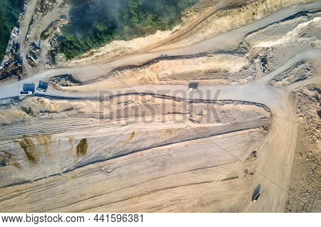 Aerial View Of Open Pit Mining Site Of Limestone Materials Extraction For Construction Industry With