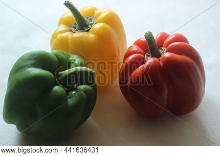 Red Yellow And Green Bell Peppers. Bell Pepper Or Capsicum Annuum, Also Called Sweet Pepper Or Capsi