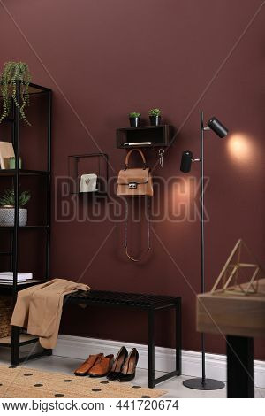 Modern Hallway Interior With Stylish Furniture And Key Holder