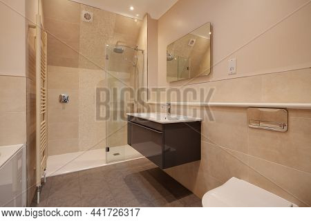 Clavering, England -  April 6 2020: Well Lit Partially Tiled Shower Room Wc Within Recently Complete