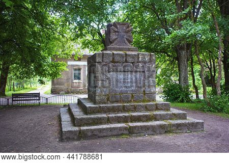 Krasnolesye, Russia - June 12, 2016: Monument With The Iron Cross To The Memory Of The Fallen German