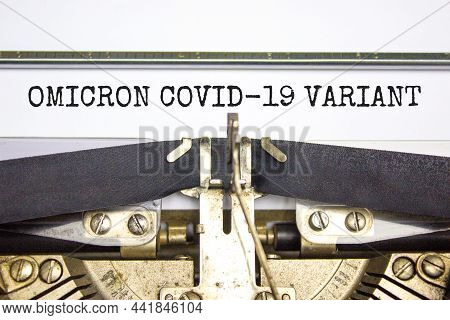 Covid-19 New Omicron Virus Variant Symbol. Concept Words Omicron Covid-19 Variant Typed On Retro Typ