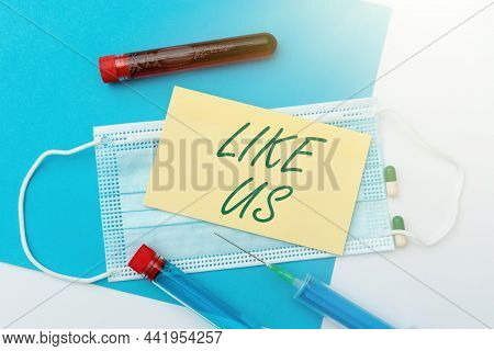 Hand Writing Sign Like Us. Business Concept Asking To Follow On Social Media Feel Attraction Or Plea