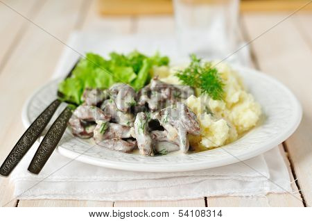 Liver Srtoganoff With Salad Leaves And Mashed Potatoes