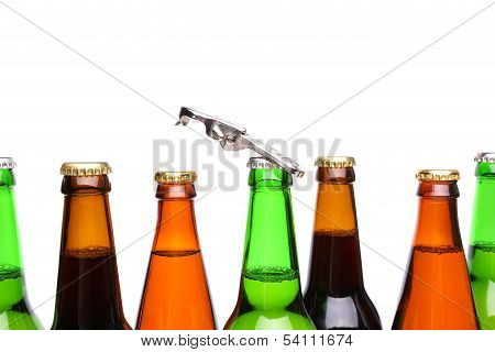 Top bottles of beer and a opener