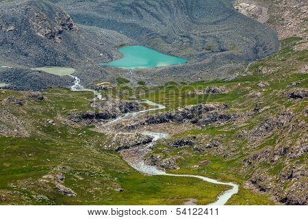Majestic heart-shaped mountain lake in Kyrgyzstan