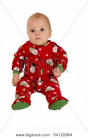 Toddler Boy Sitting In Red Snowman Pajamas