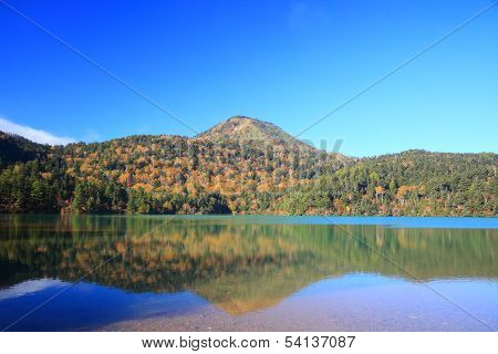 Mountain And Pond In Autumn