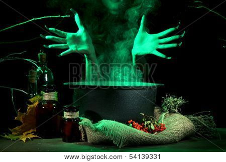  Witch in scary Halloween laboratory on dark color background