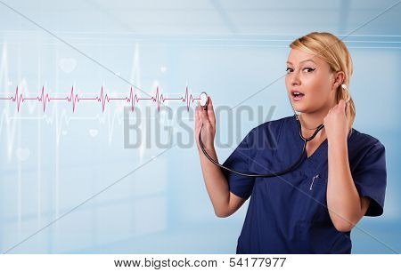 Pretty young medical doktor listening to red pulse and heart rates