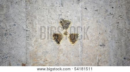 Grey wall with radioactivity symbol. Background image