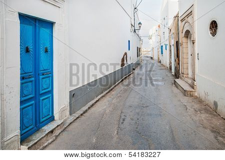 Small Street And Wooden Door