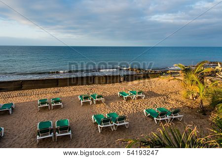Sunbeads On The Beach In The Morning Sun In A Part Clody Day