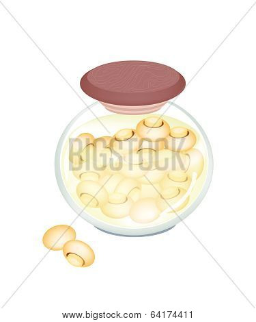 Marinaded Champignons In A Jar On White Background