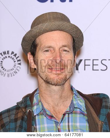 LOS ANGELES - MAR 28:  Denis O'Hare arrives to the Paleyfest 2014: American Horror Story COVEN  on March 28, 2014 in Hollywood, CA                