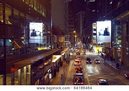 Queen`s Road East by night at Hong Kong
