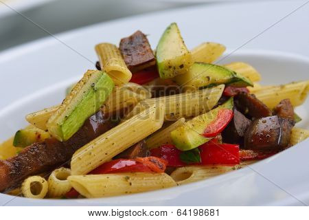 Pasta with shrimps, herbs and mashrooms isolated on white background in studio
