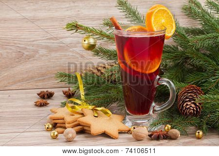 mulled wine with decorated christmas tree
