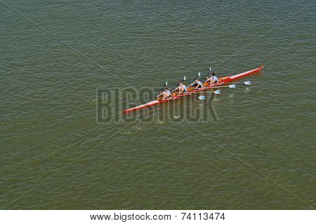Four Men Rowing On Danube River