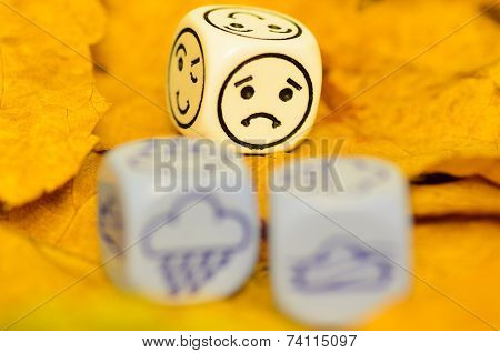 Depressing And Sad Weather Of Autumn Shown On Dice