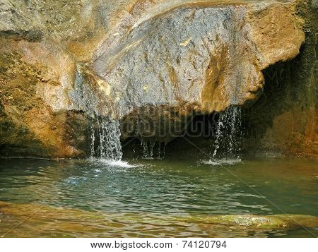 Small waterfall and lagoon on river