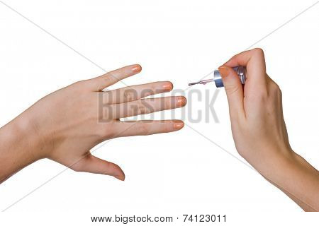 Women hands and manicure brush, isolated on white background