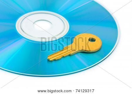 Computer disk and key isolated on white background