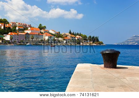 Pier and town - abstract travel background