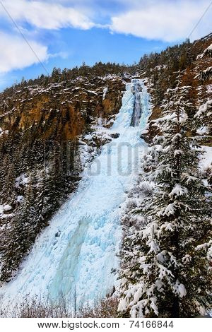 Waterfall Stuibenfall at Umhausen Tirol Austria - nature and travel background
