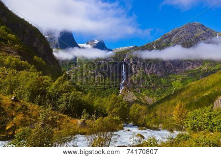 Waterfall near Briksdal glacier - Norway - nature and travel background