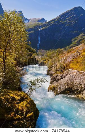 Waterfall near Briksdal glacier - Norway - nature and travel background