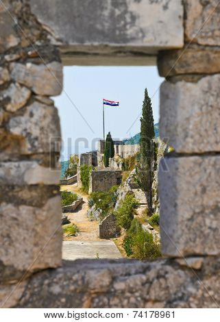 Window at old fort in Split, Croatia - architecture background