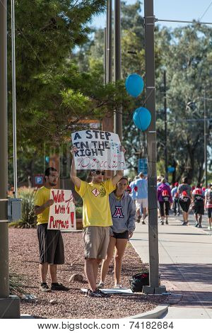 Young Woman Encouraging Aidswalk Participants