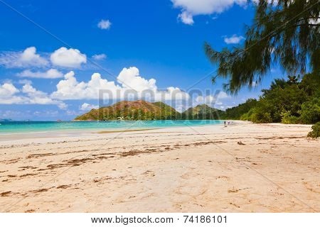 Tropical beach Cote d'Or at island Praslin Seychelles - vacation background
