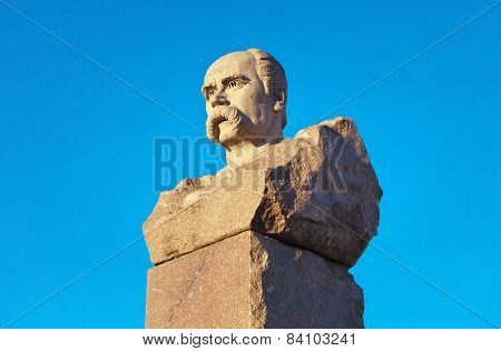 Taras Shevchenko Monument In Energodar On Blue Sky Background