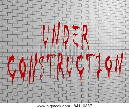 Under Construction - Inscription On A Brick Wall With Oil Paint Streaks