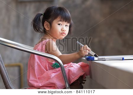 Lovely Kid Practice For Writing On White Broad Before Class Learning In Pre Kindergarten
