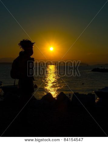 Young Woman Enjoying Sunset