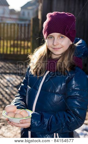 Pretty Girl Holding  Organic Eggs